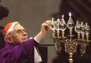 Benedict lights the Jewish Menorah